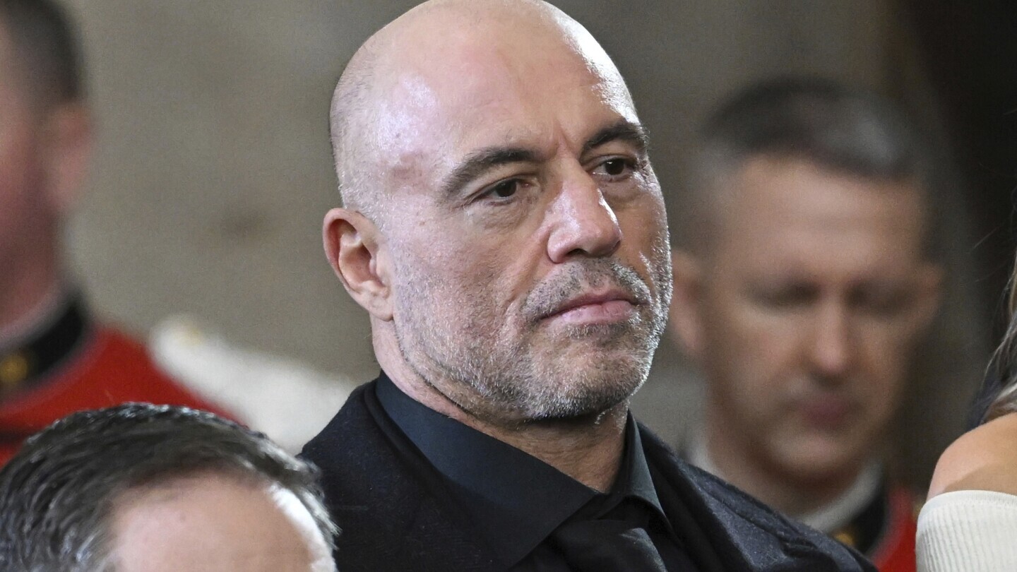 Joe Rogan stands for a benediction after President Donald Trump was sworn in during the 60th Presidential Inauguration in the Rotunda of the U.S. Capitol in Washington, Jan. 20, 2025. (Saul Loeb/Pool photo via AP, File)
