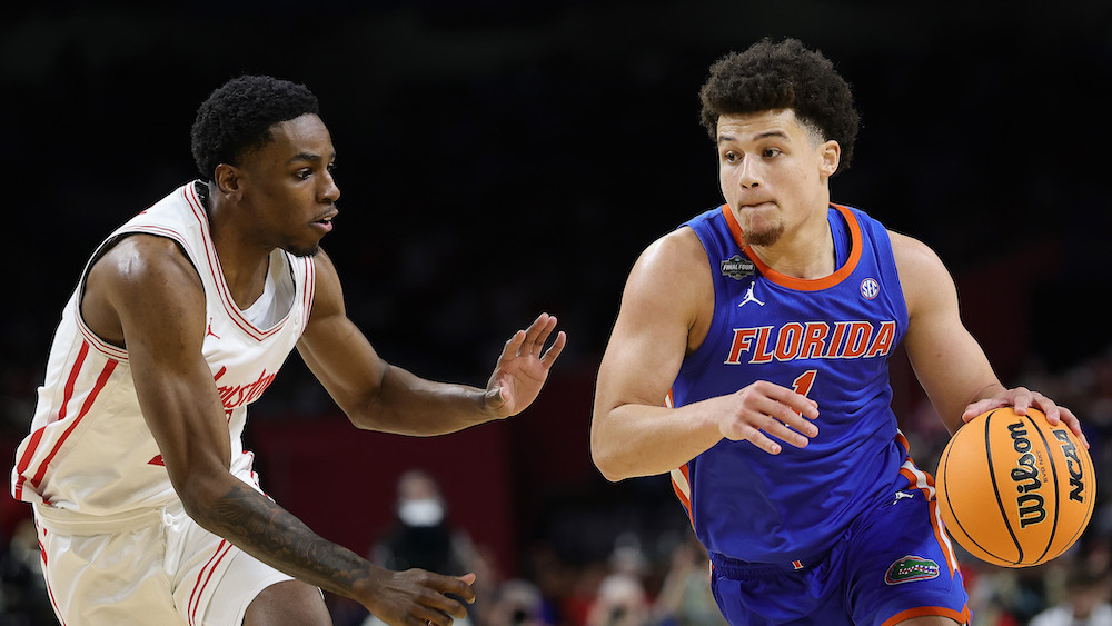 SAN ANTONIO, TEXAS - APRIL 07: Walter Clayton Jr. #1 of the Florida Gators drives the ball against the Houston Cougars defense during the second half in the National Championship of the NCAA Men's Basketball Tournament at the Alamodome on April 07, 2025 in San Antonio, Texas. (Photo by Alex Slitz/Getty Images)