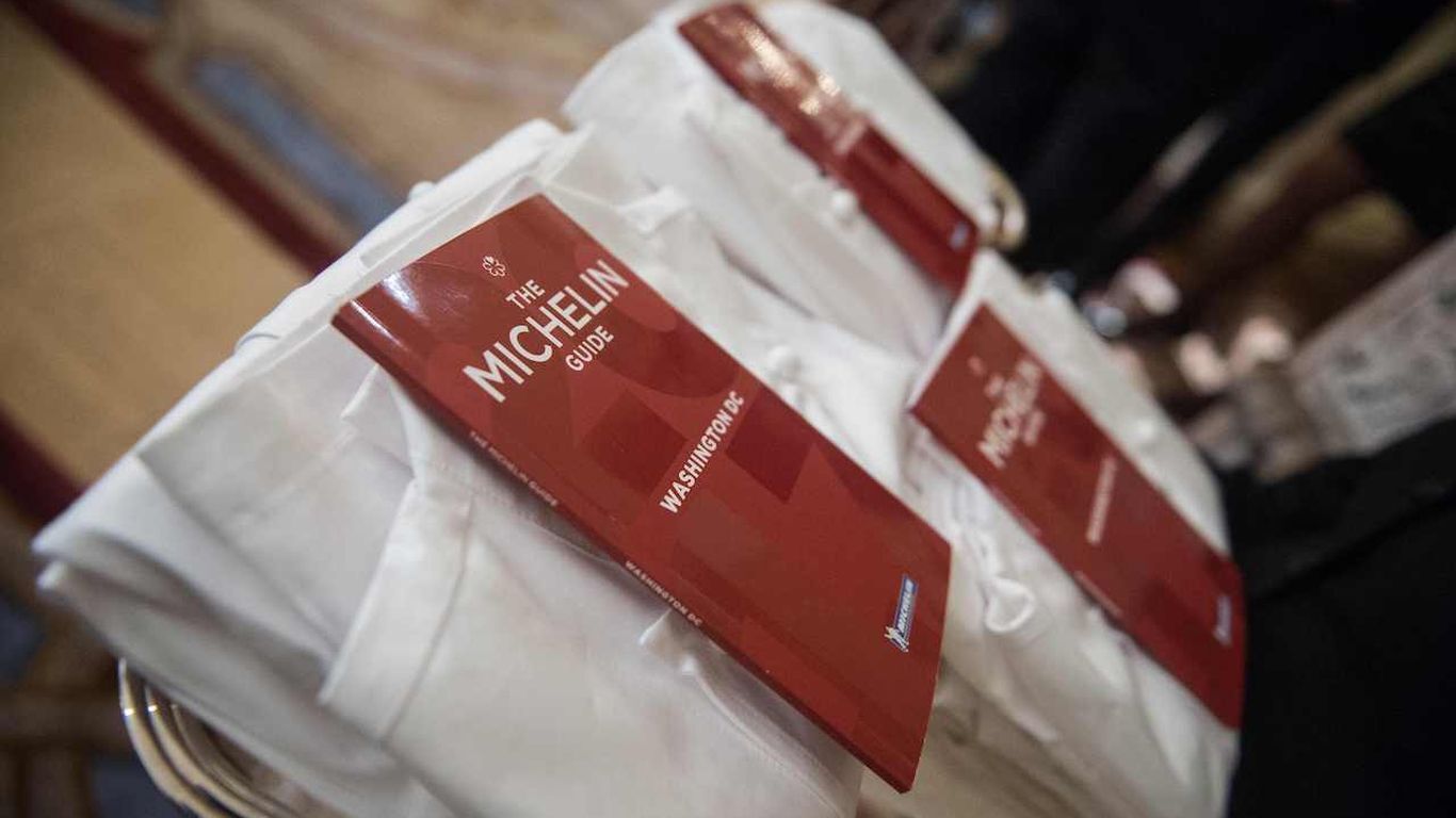 The first Michelin Red Guide for Washington is seen at the residence of the French ambassador during its launch in Washington, DC, on October 13, 2016. / AFP PHOTO / NICHOLAS KAMM (Photo credit should read NICHOLAS KAMM/AFP via Getty Images)