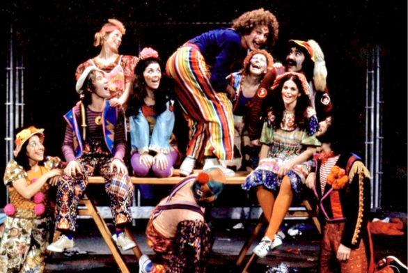Victor Garber (center) as Jesus, surrounded by Martin Short, Gilda Radner, Eugene Levy, Andrea Martin and more in 1972 Toronto 'Godspell' production.