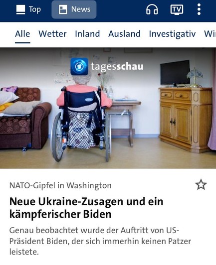 Screenshot Tagesschau App:
Bild zeigt eine alte Dame im Rollstuhl an einem Tisch - sie sitzt mit dem Rücken zur Kamera.
Darunter die Schlagzeile: „Neue Ukraine-Zusagen und ein kämpferischer Biden“